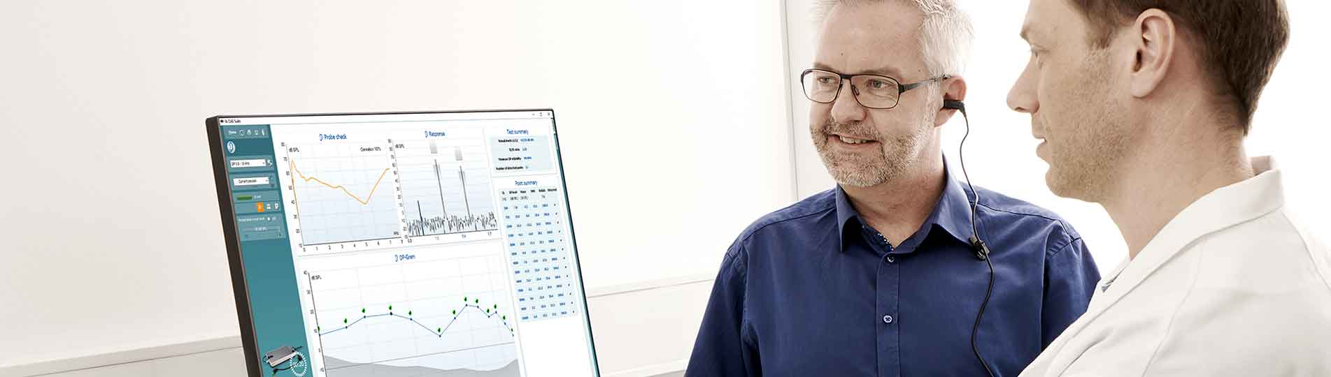 Male clinician performing DPOAE testing on male patient