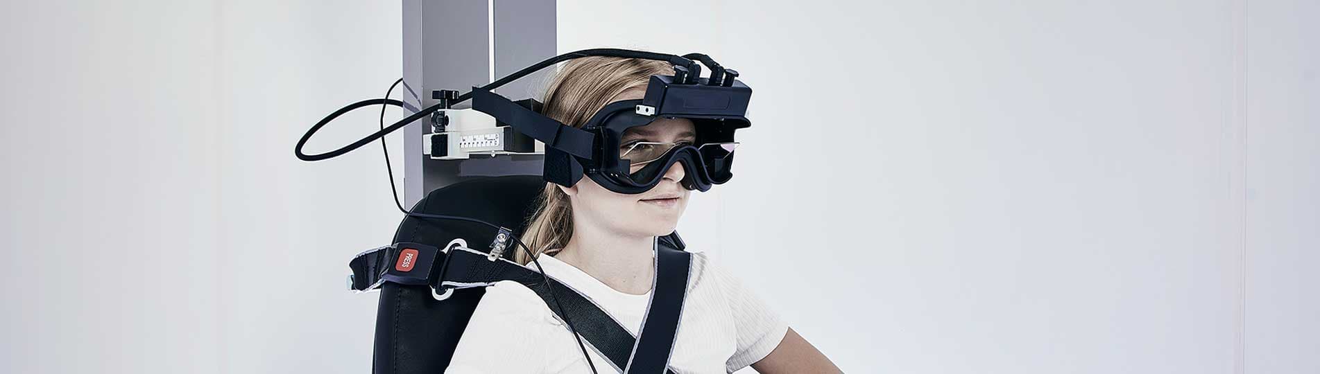 Girl-in-vestibular-rotary-chair-1903x540