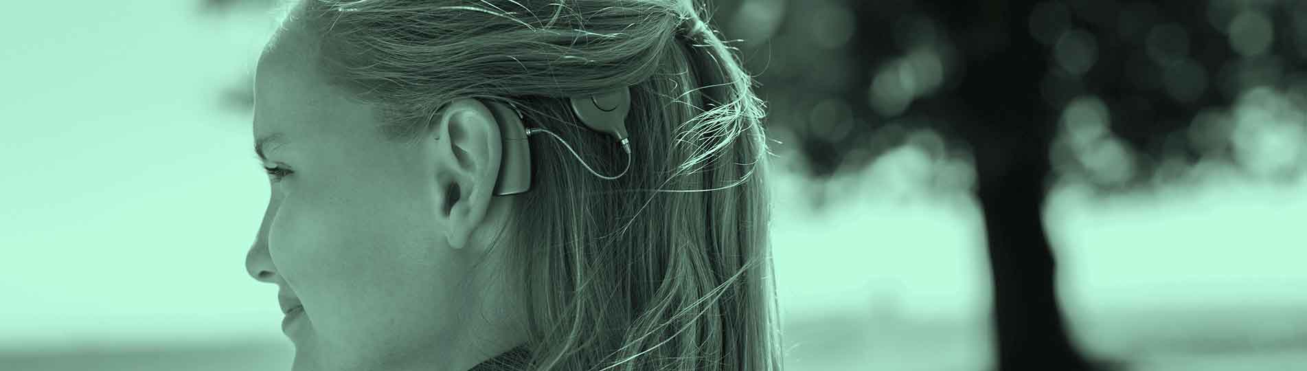 Girl fitted with a cochlear implant