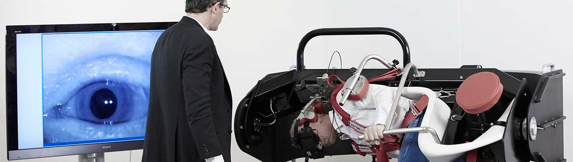 Thomas-Richard-Vitton-performing-maneuver-on-patient-in-Interacoustics-TRV-Chair