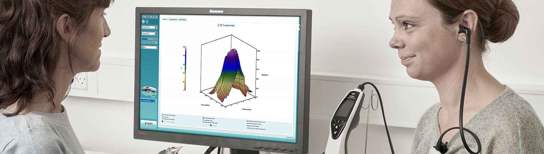 Female clinician performing wideband tympanometry in female patient