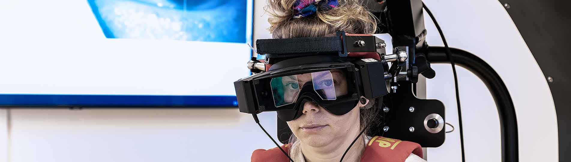 Woman in TRV Chair wearing VNG goggles
