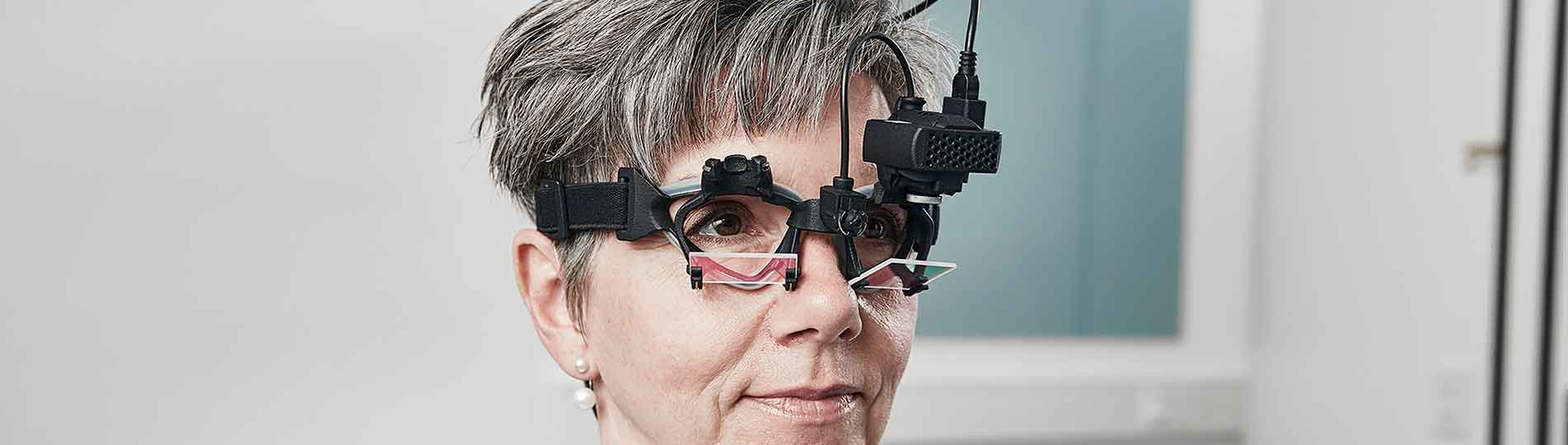 Woman wearing vHIT goggles